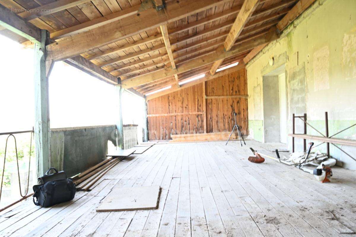 Maison en pierre avec deux logements, terrasse panoramique et potentiel exceptionnel à DOUZILLAC (24) - photo 7