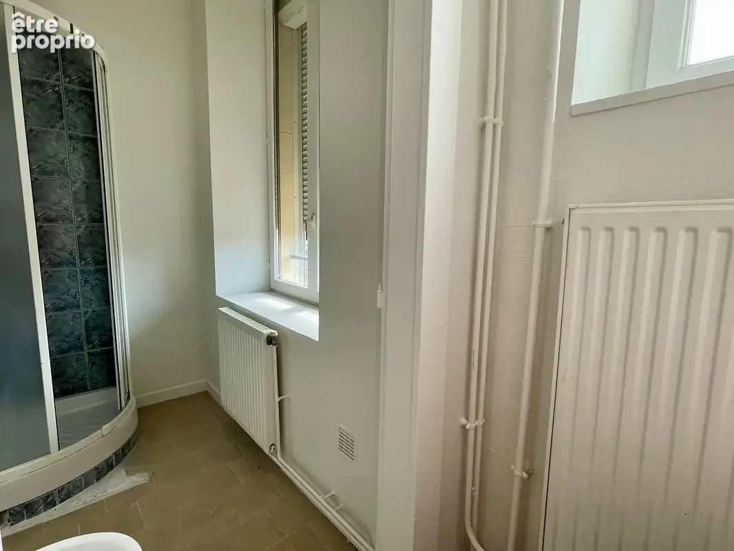 Appartement F4 2ème étage 3 chambres - photo 5