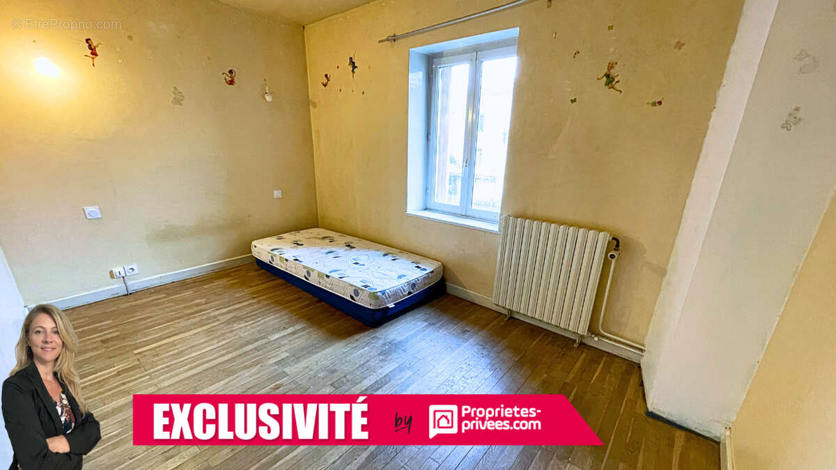 Maison à COURS-LA-VILLE