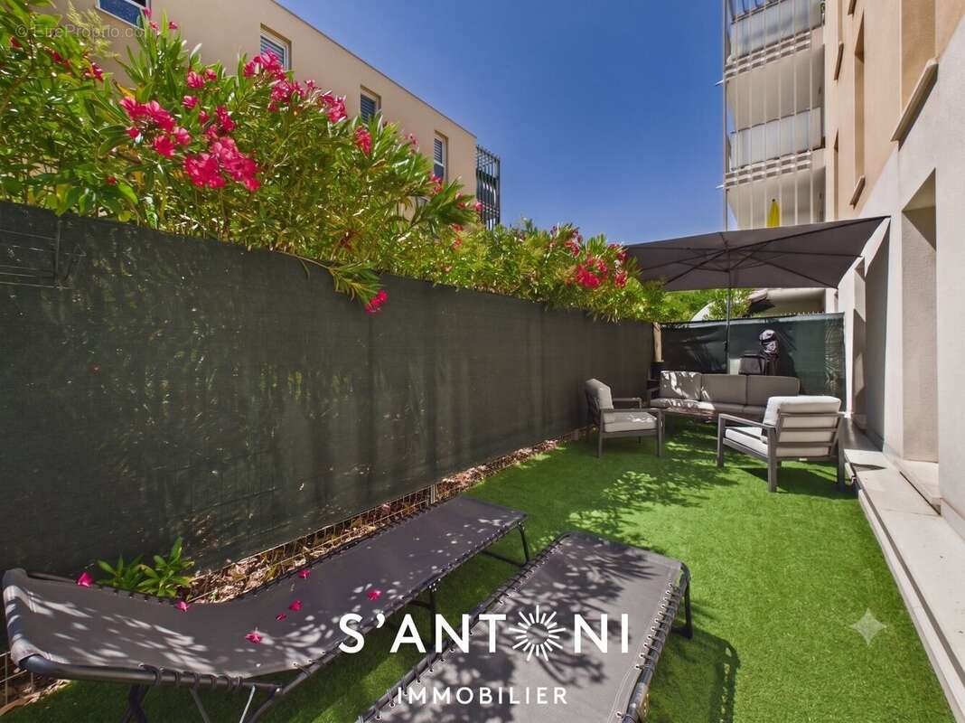 Appartement T3 de 60m² avec terrasse et jardin - photo 12