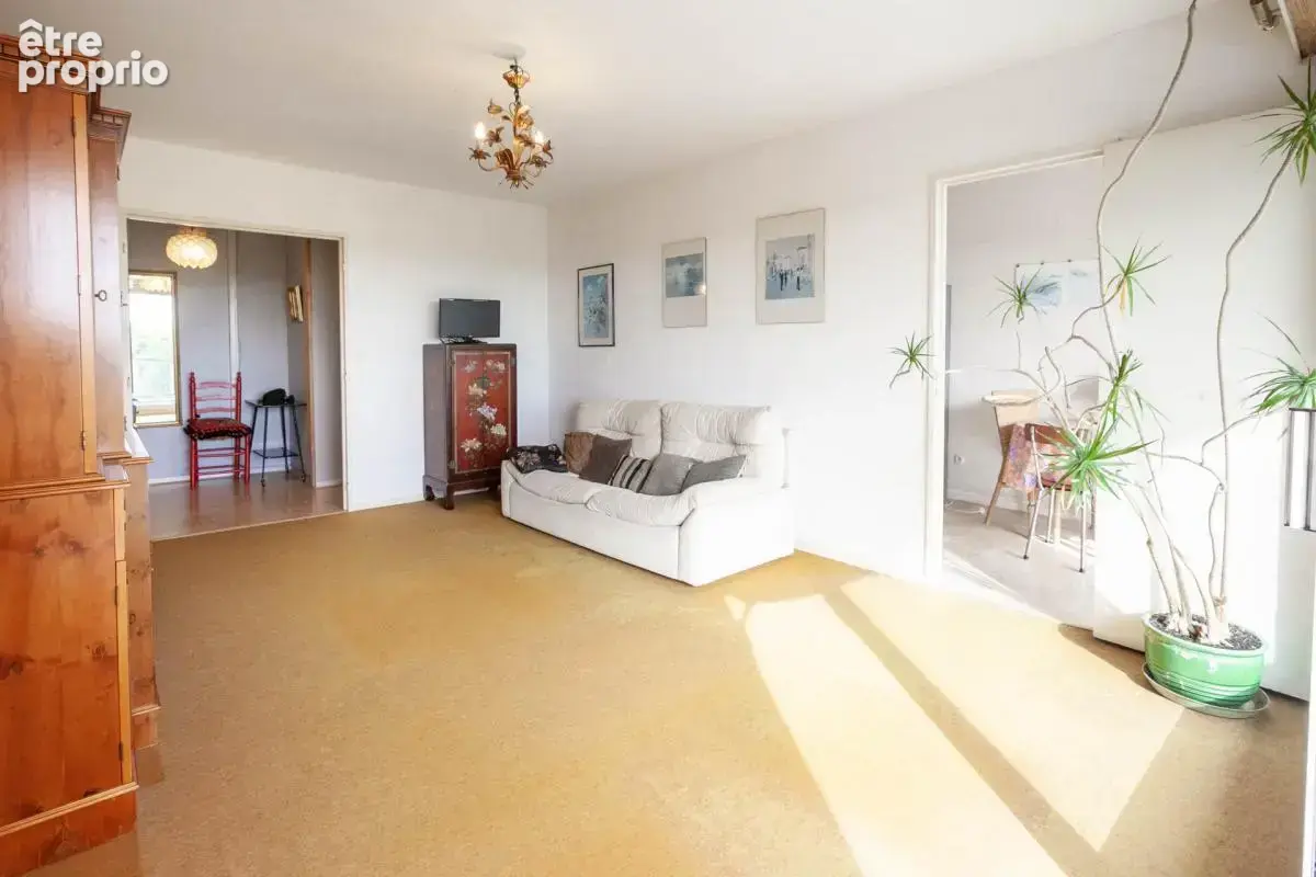Appartement T3 72m² avec balcon plein sud - Box en sous-sol - photo 3