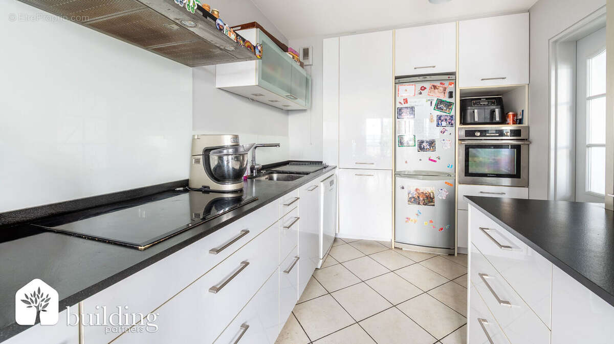 Courbevoie/Faubourg de l'Arche - Duplex familial 4 pièces de 103.54 m² avec 18.87 m² de terrasse, box et cave - photo 5