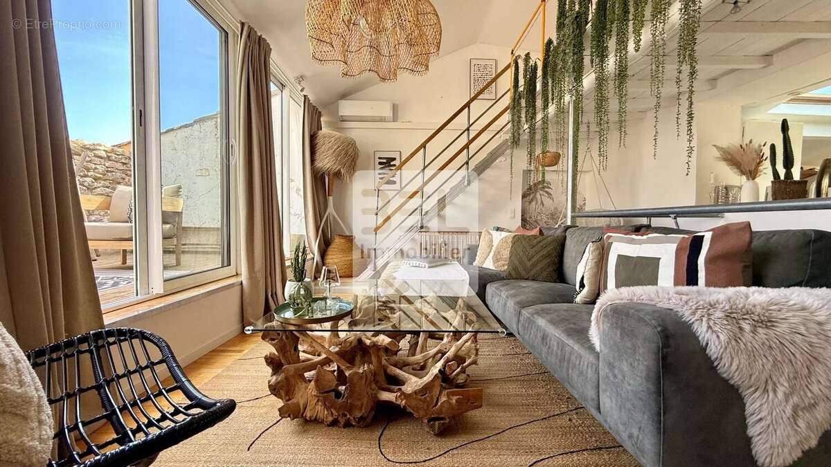 Maison à LAUDUN-L'ARDOISE