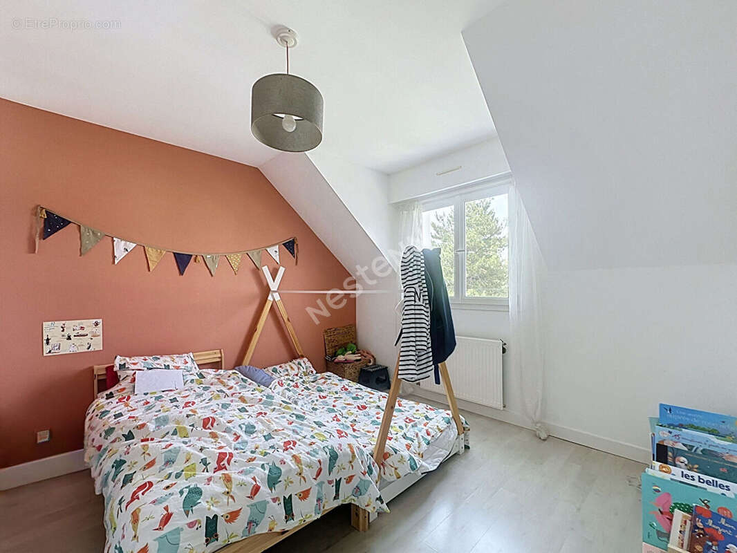 Nantes Eraudière - Maison 125m², 4 chambres, garage et jardin - photo 7