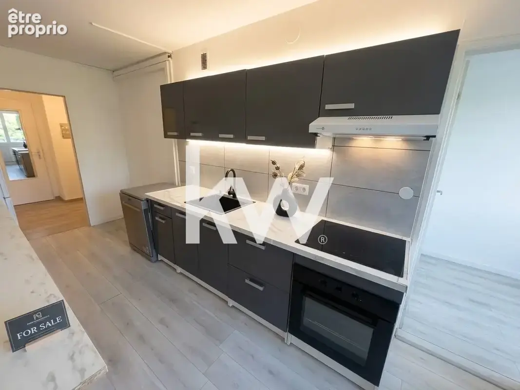 Appartement 5 pièces 96 m² à vendre à Saint-Etienne (42000) - photo 2
