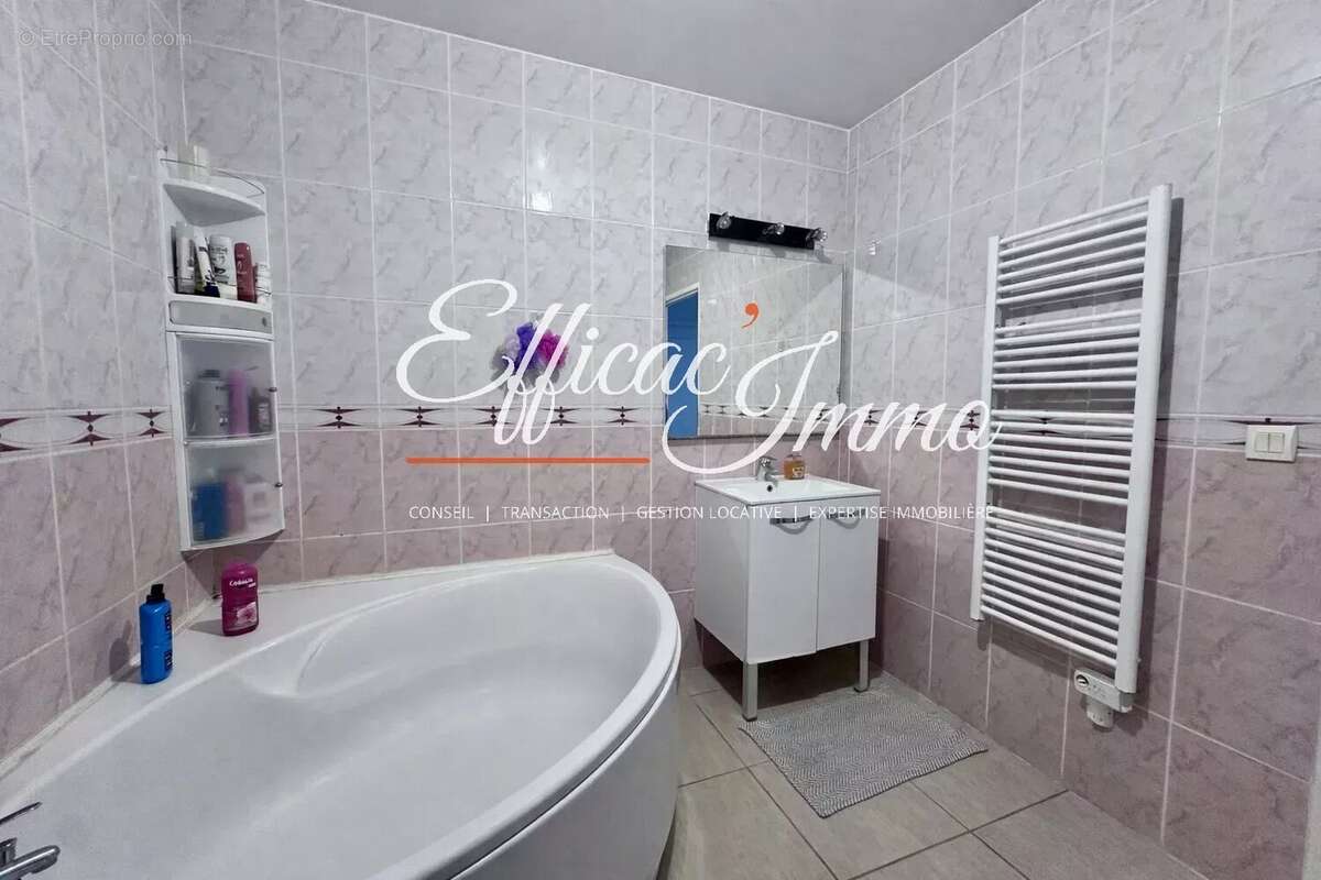 Appartement t4 de 97,06 m² – balcon – box privatif - photo 13