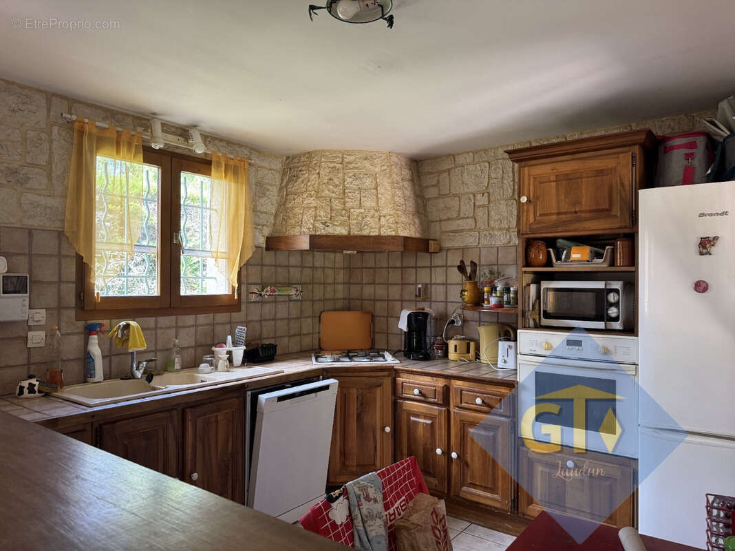 Maison à LAUDUN-L'ARDOISE