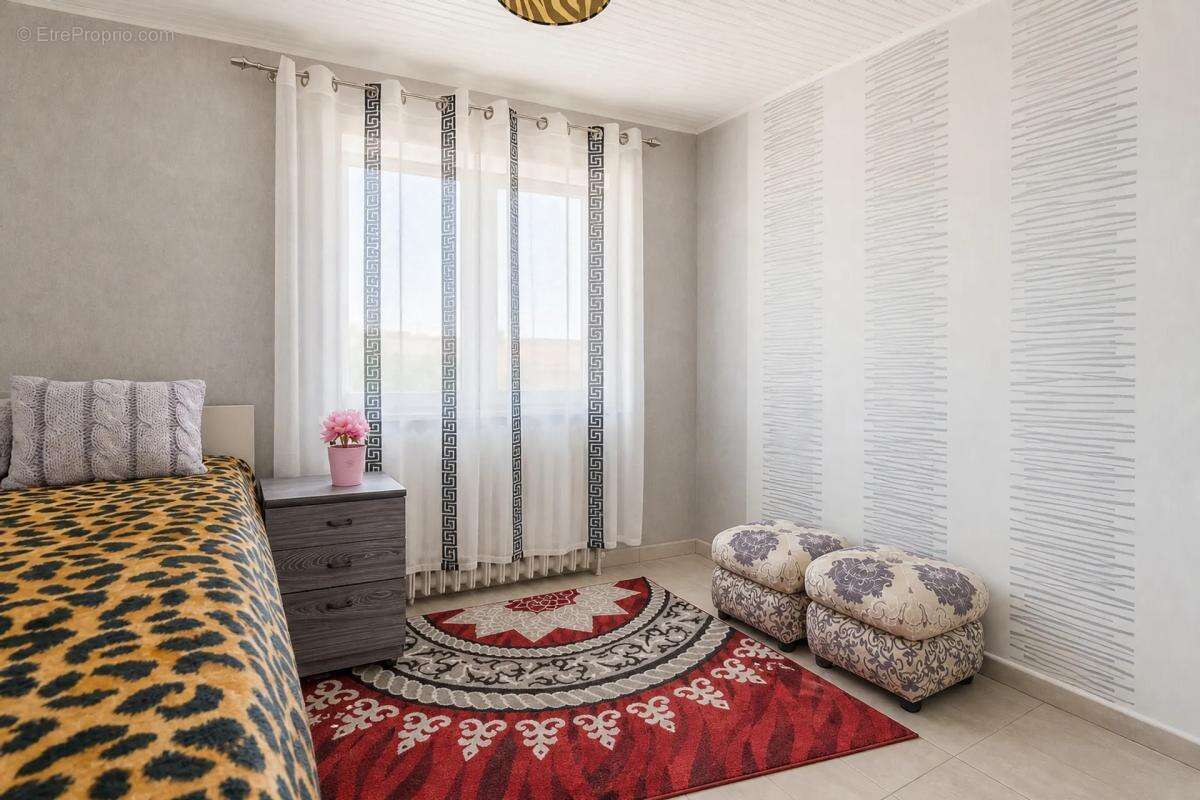 Maison de 5 pièces de 150 m² située à Sainte-Savine - photo 9