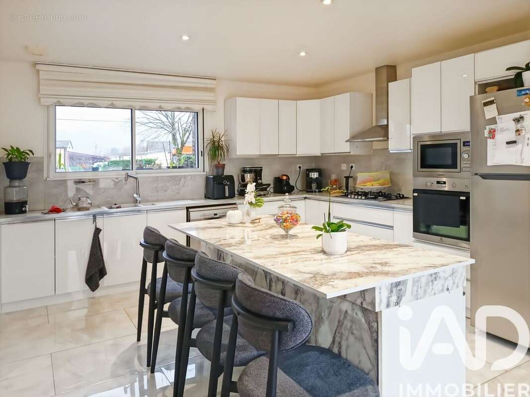 Photo 2 - Maison à TERRASSON-LAVILLEDIEU