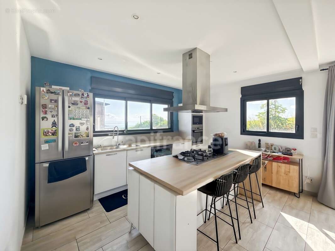 Une maison contemporaine avec vue mer, volumes généreux et cadre de vie privilégié à Sainte-Marie - photo 4