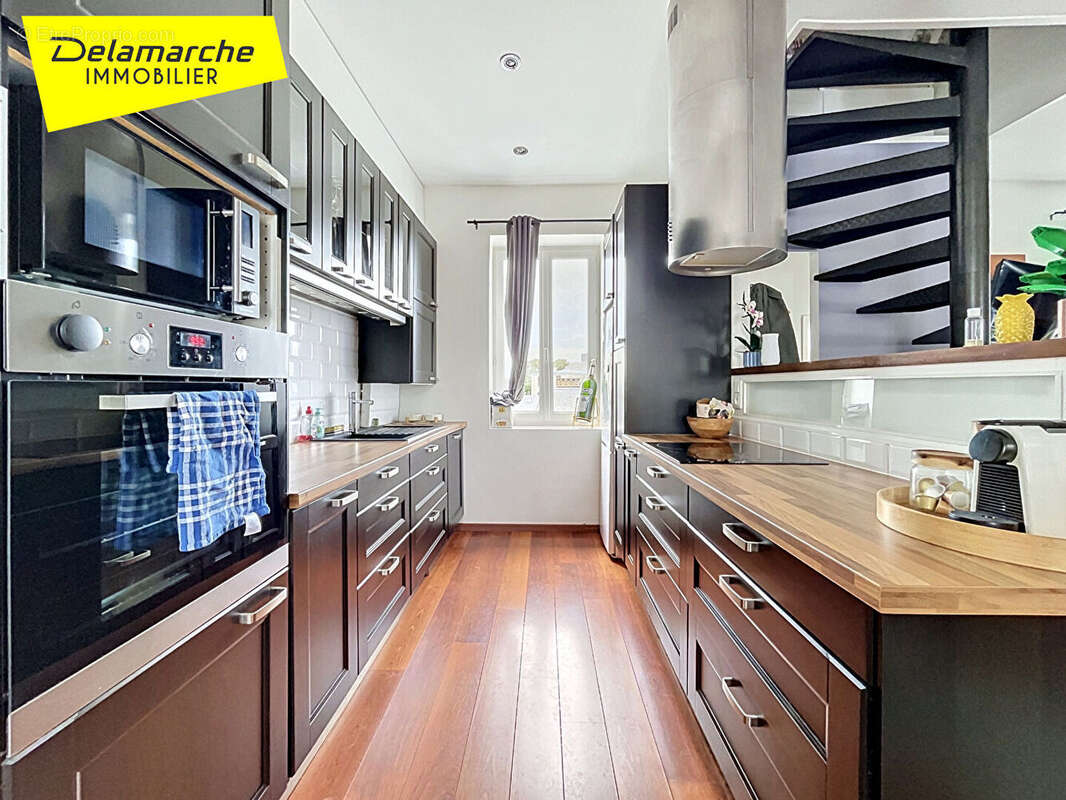 Appartement à DONVILLE-LES-BAINS
