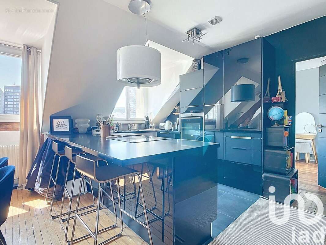 Photo 8 - Appartement à COURBEVOIE