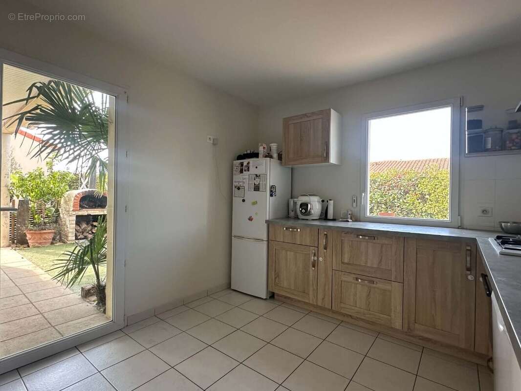 Maison de plain-pied de 87 m²  La Tourlandry (49120) - photo 4
