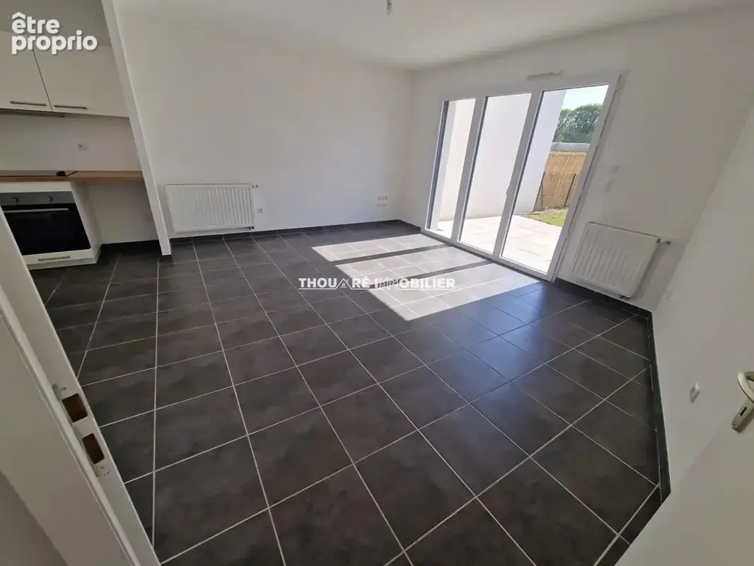 Maison Carquefou 3 pièce(s) 61.35 m2 Plain pied  - 2 chambres Centre ville au calme !! - photo 2