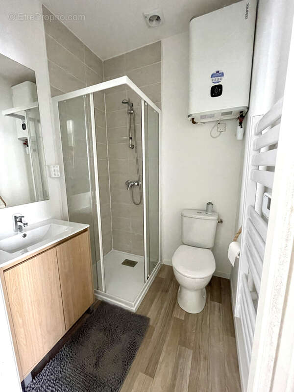 Immeuble comprenant 4 logements rénovés - photo 9