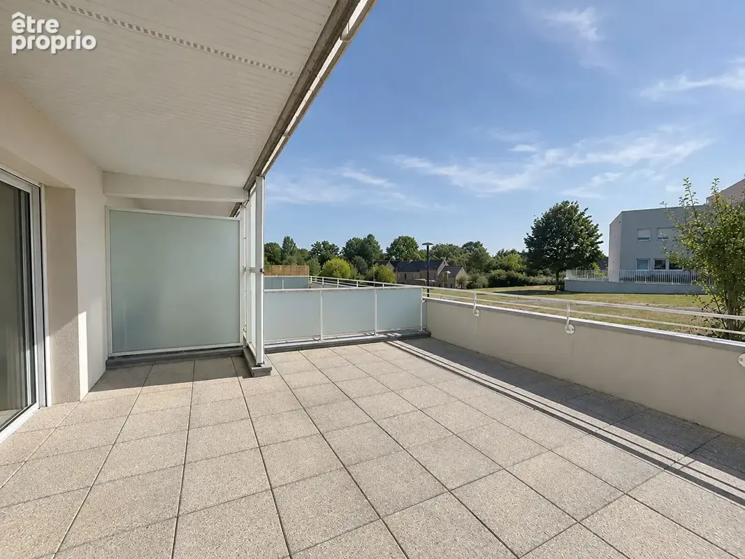 ACIGNE - Appartement en RDC avec terrasse - photo 7