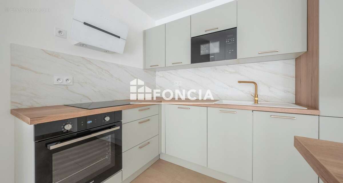  T2 de 43 m² + Jardin 23m2– Place de stationnement - photo 2