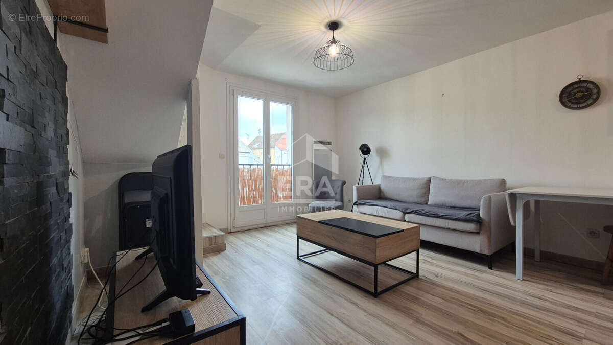 Appartement à COUBERT