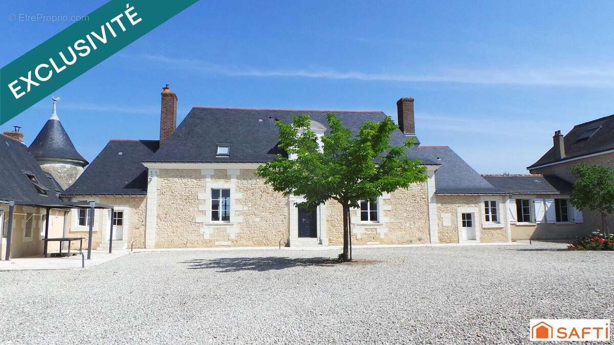 Photo 2 - Maison à NEUILLE-PONT-PIERRE