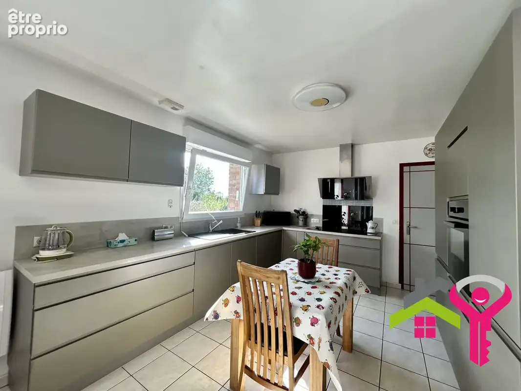 Maison 5 pièces 115 m² à vendre à Le Favril (59550) - photo 2