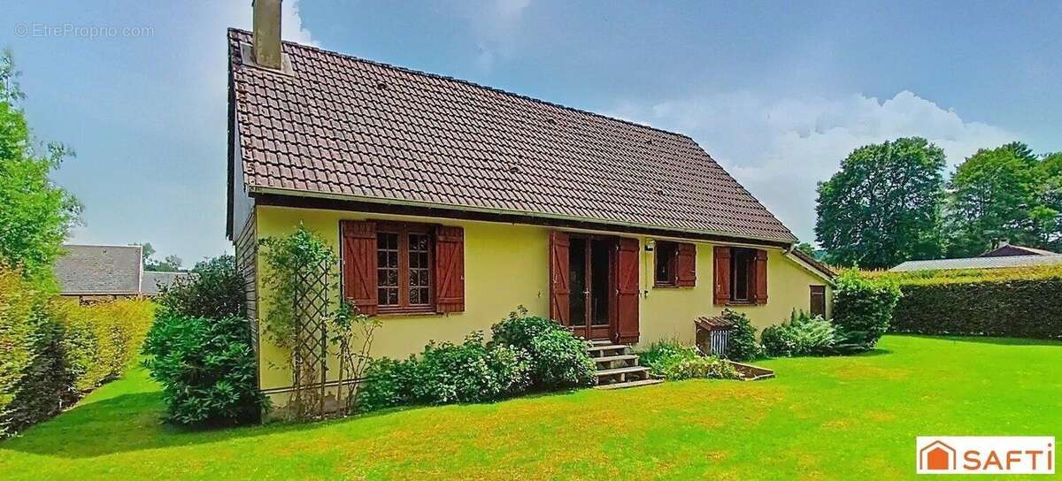 Photo 2 - Maison à LA MADELEINE-BOUVET