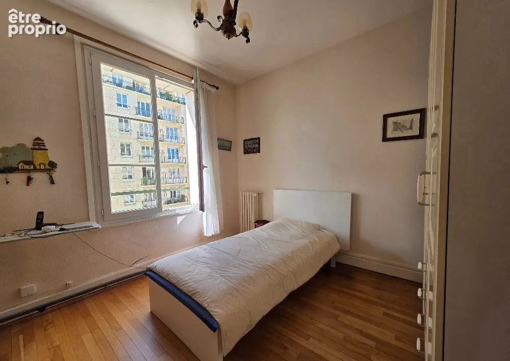 Appartement à vendre  en EXCLUSIVITE 82,34 m²  3 pièces  2 chambres  Ascenseur  Cave - photo 6