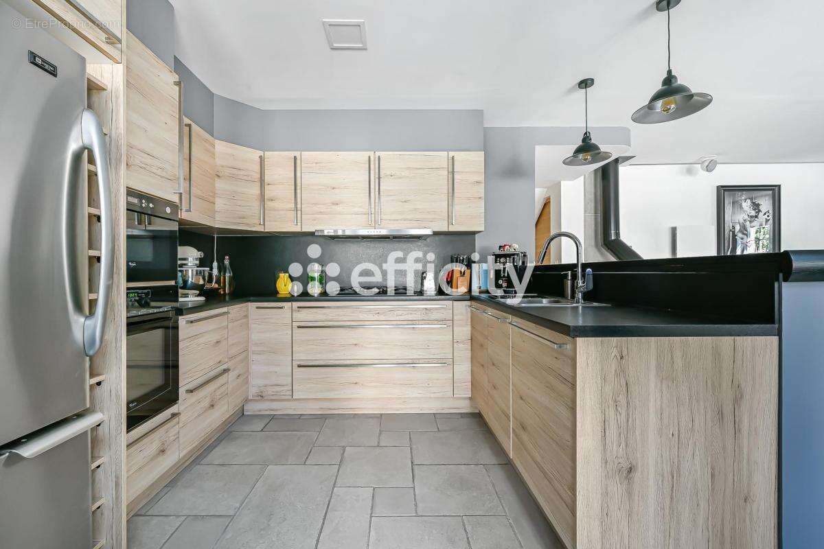 Maison 128 m² à Aulnay-Sous-Bois  - photo 12