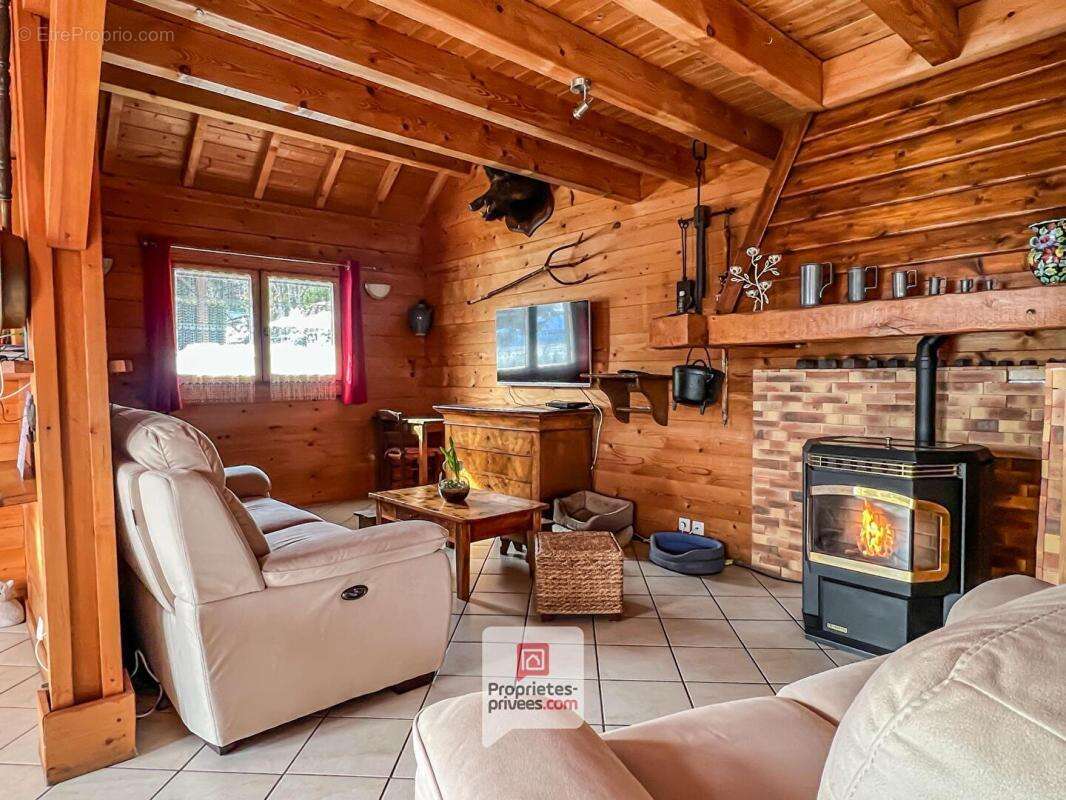 Plateau des Petites Roches (38660) - Chalet T6 en madriers + studio + carport + jardin - photo 8