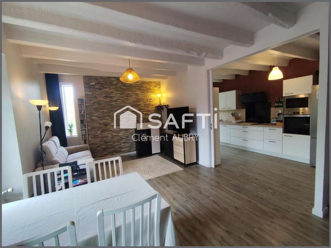 Maison 124 m² à Saint-Ouen-Des-Toits  - photo 4