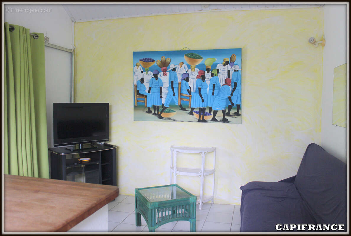 A vendre a kourou (97310) une magnifique maison en bois t5 de 106 m² avec 2 maisons t2 independantes - terrain de 775 m² - au pr - photo 21