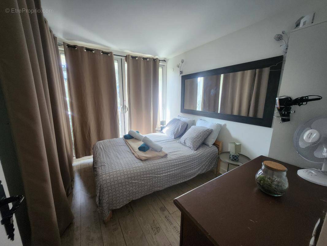 IDEAL INVESTISSEUR : appartement comprenant 4 chambres, 2 balcons, une cave, ascenseur - photo 4