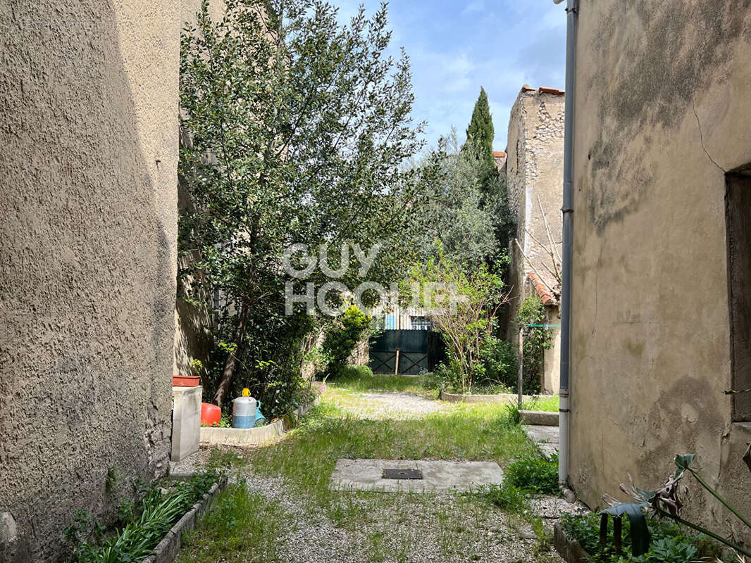 bâtiment ancien de 400 m² plein coeur de ville à restaurer - photo 9