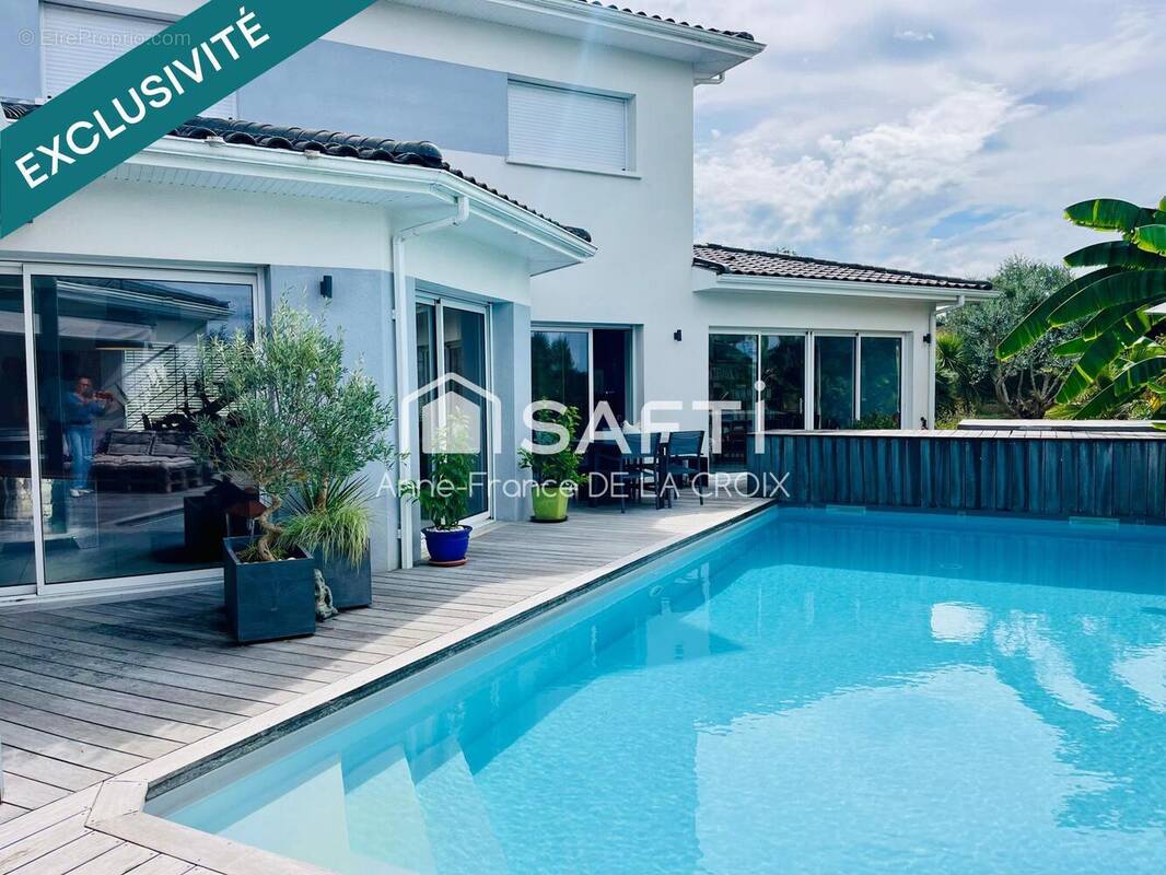 Photo 1 - Maison à LE HAILLAN