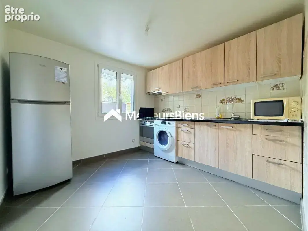Maison 87 m² - 4 Chambres - jardin et garage - photo 4