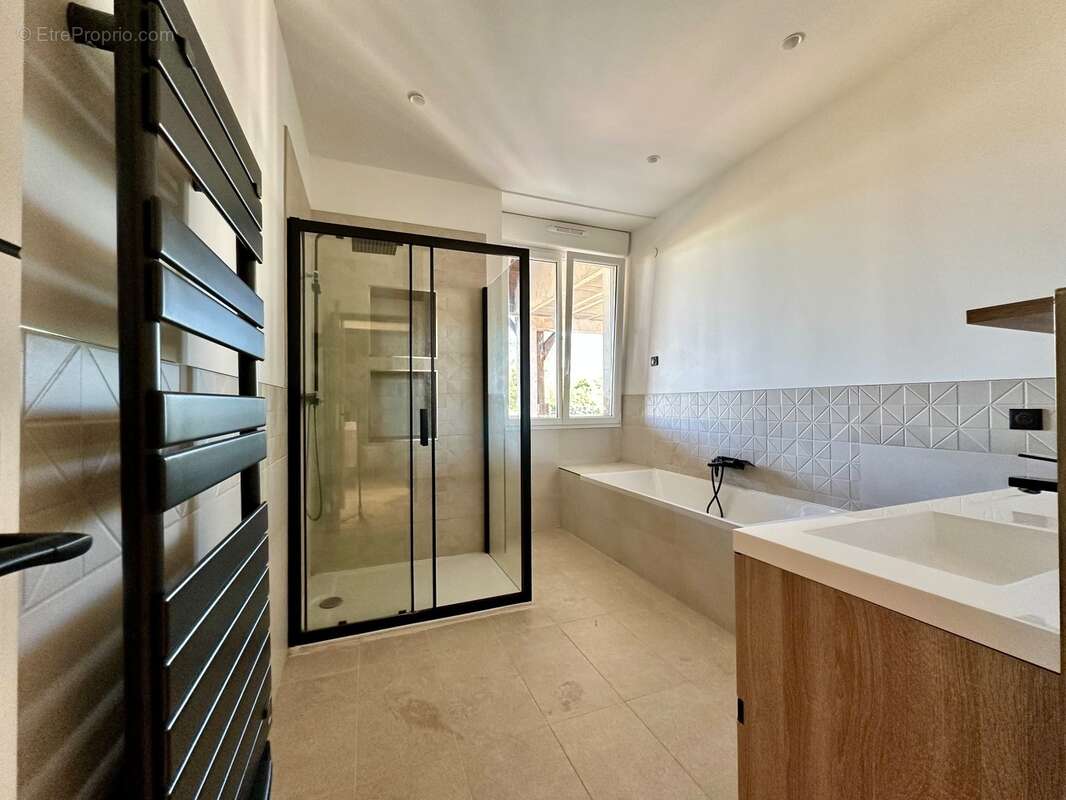 Duplex 100 m2 en rez-de-jardin à vendre 3 pièces FORGES LES BAINS (91) - photo 10