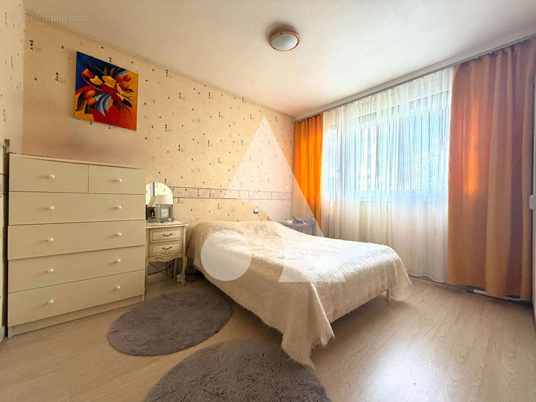 Appartement 4 pièces de 75 m², idéalement situé à deux pas de Nancy, avec garage. - photo 7