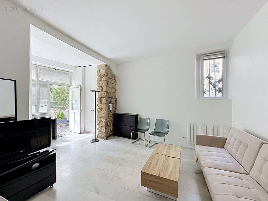 Appartement Paris 1 pièce(s) 30 m2 - photo 11