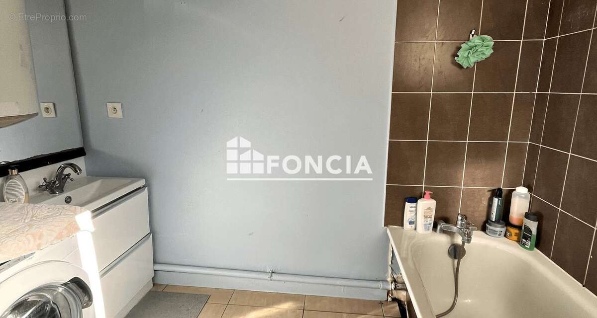 Appartement T4 avec 2 balcons et parking, vendu loué - photo 7