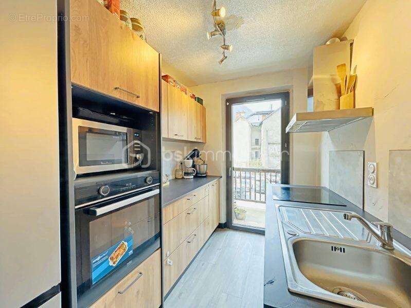 Appartement T4 de 86 m² avec jardin et cave - photo 5