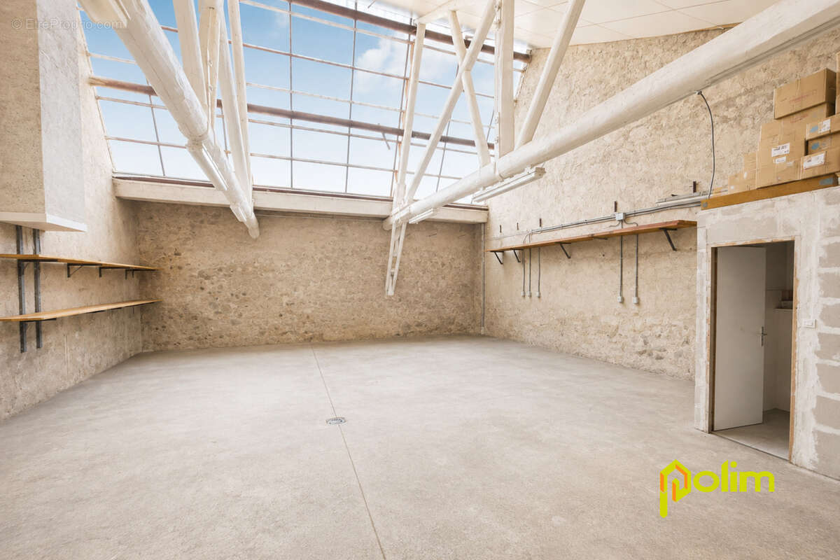Ensemble immobilier avec appartement loué et vaste dépôt - photo 9