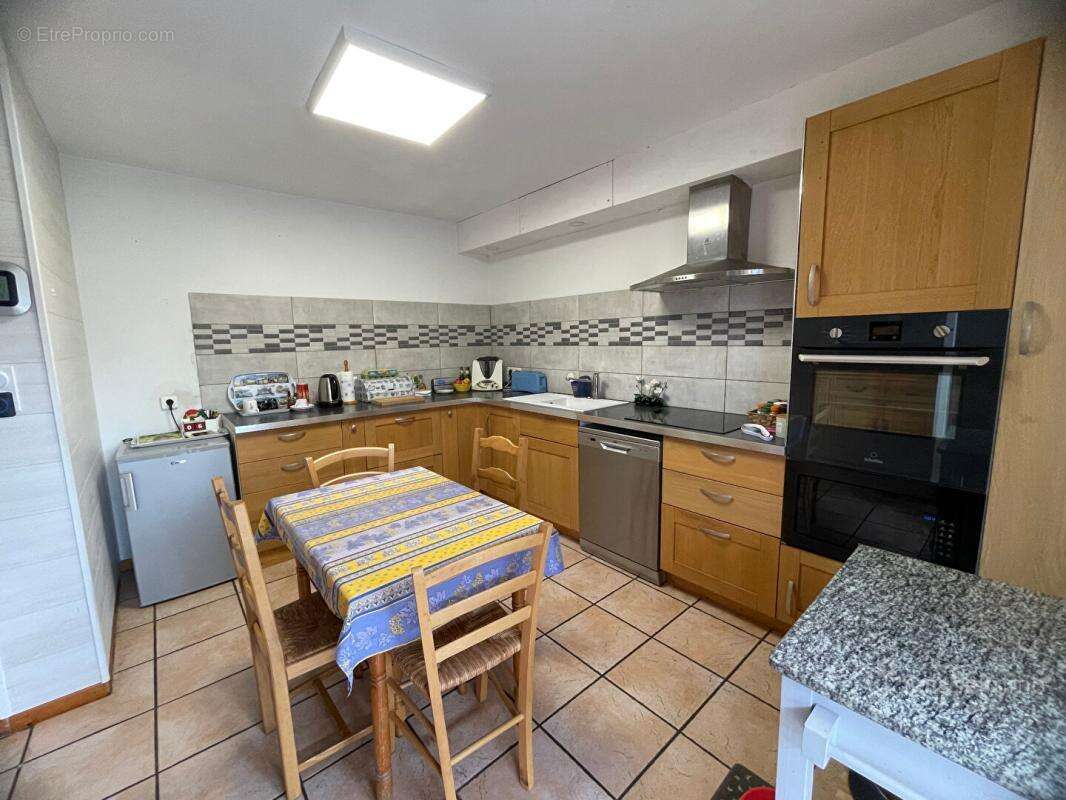 Secteur Valdoie, Maison de 138M2 sur 525M2 de terrain clos et arboré - photo 6