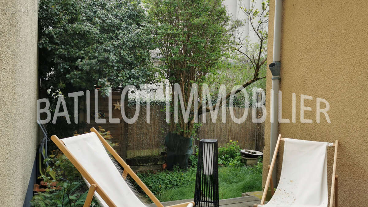 À Reims à 10mn à pied de la gare centre et du centre ville , maison familiale avec extérieur - photo 11