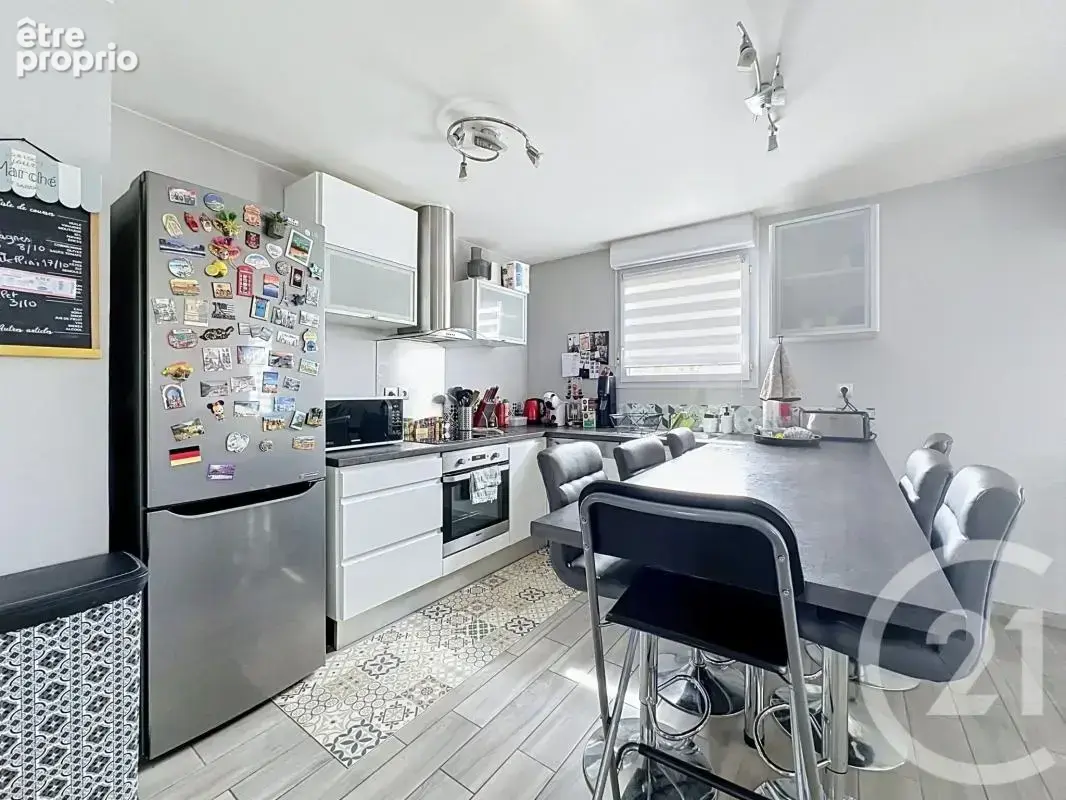 Appartement 4 pièces 89 m² à vendre à Grigny (69520) - photo 4