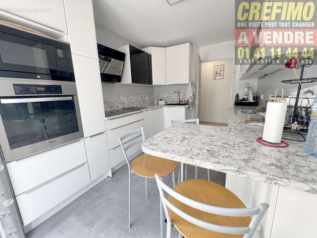 Appartement avec terrasse à Asnières-sur-Seine dans un quartier résidentiel recherché ! - photo 4