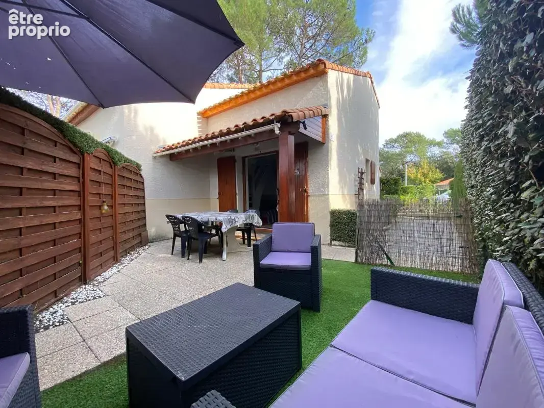 LA PALMYRE Maison 3 pièces dans Résidence Boisée avec Piscine, 400m du Centre-Ville - photo 3