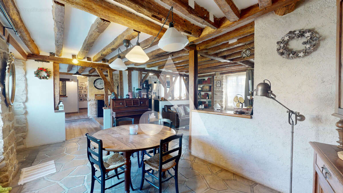 Maison à BAULNE