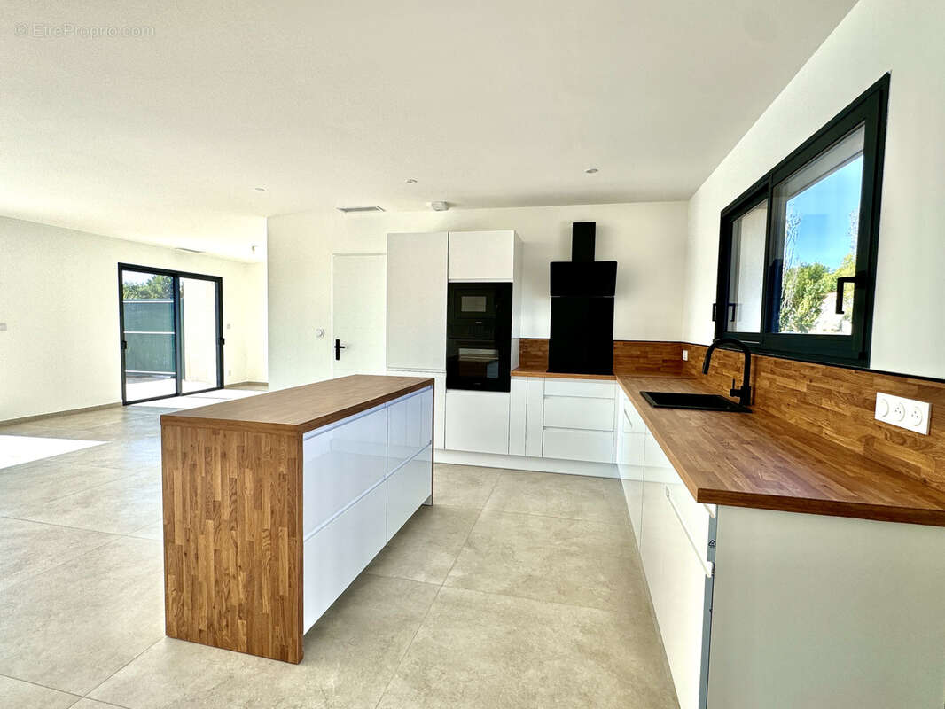 Maison à ARPAILLARGUES-ET-AUREILLAC