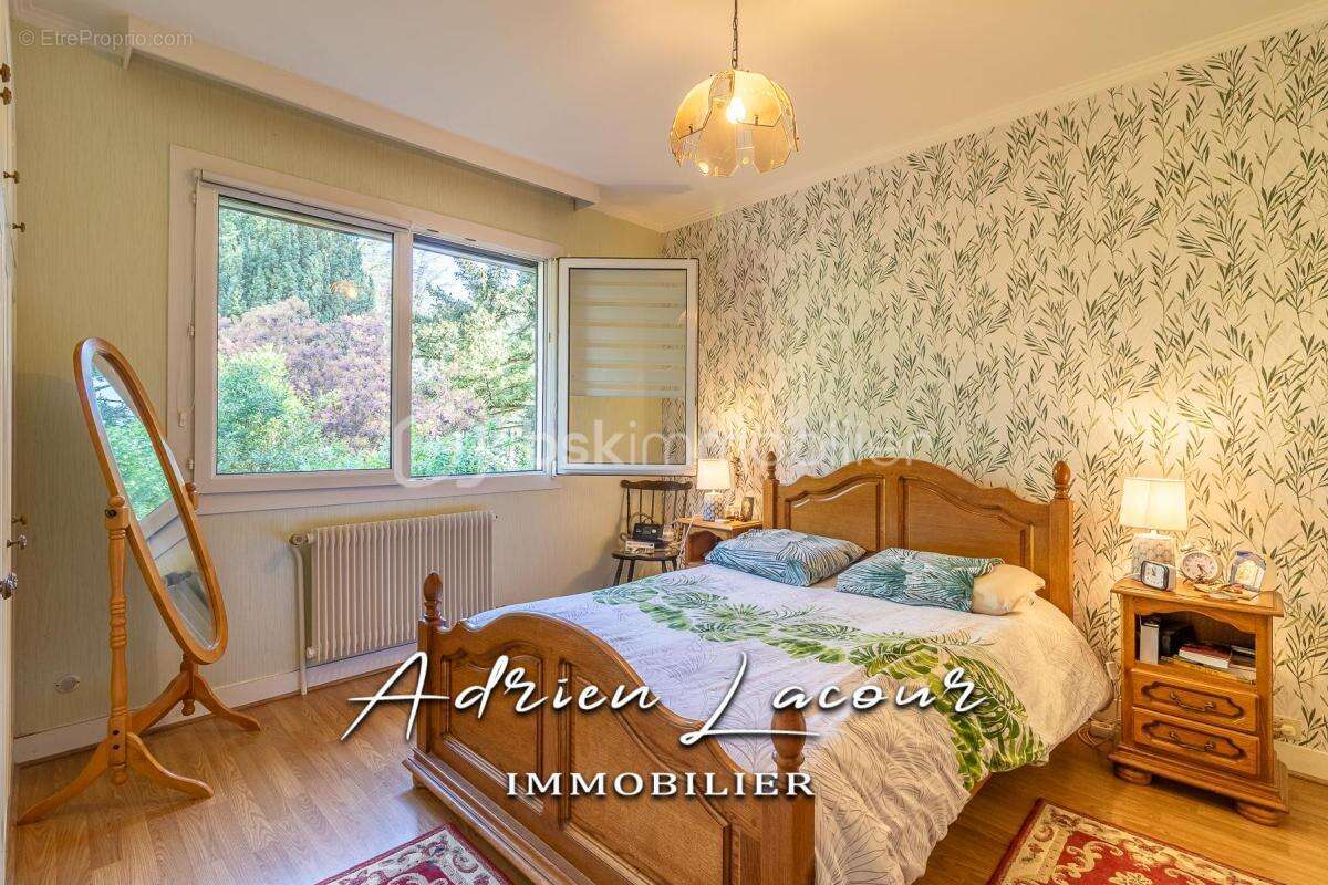 Jolie maison sur sous-sol avec son parc arboré - photo 8