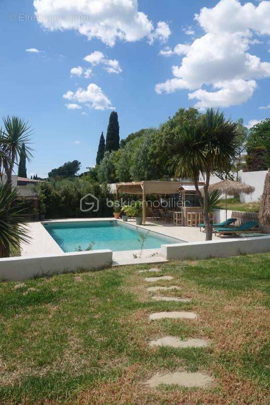 Maison individuelle de 220m2 avec 2 appartements - piscine - garage - jardin arbore - photo 4