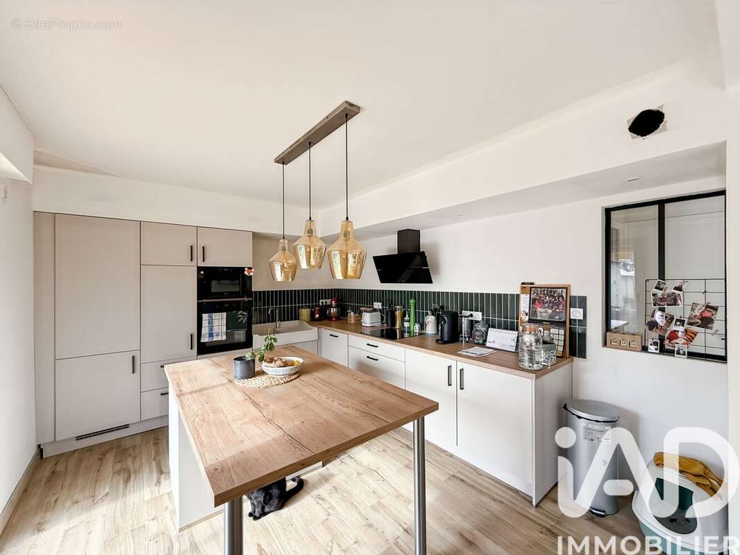Maison 126 m² à Saint-Jacques-De-La-Lande  - photo 6